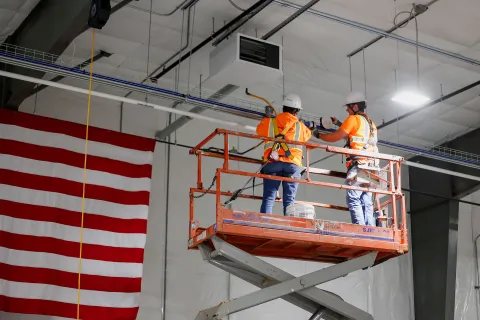 Workers In Warehouse